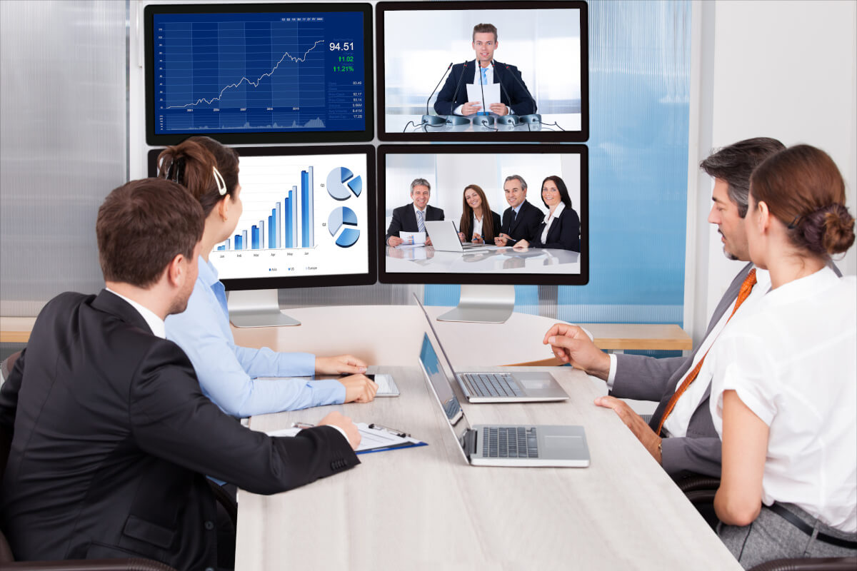 Business team participating on a video conference presentation