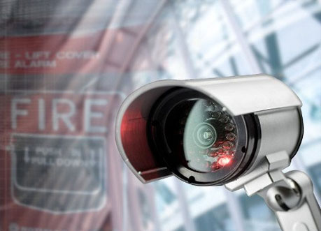 Security camera with fire warning signs